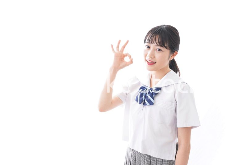 OKサインをする学生