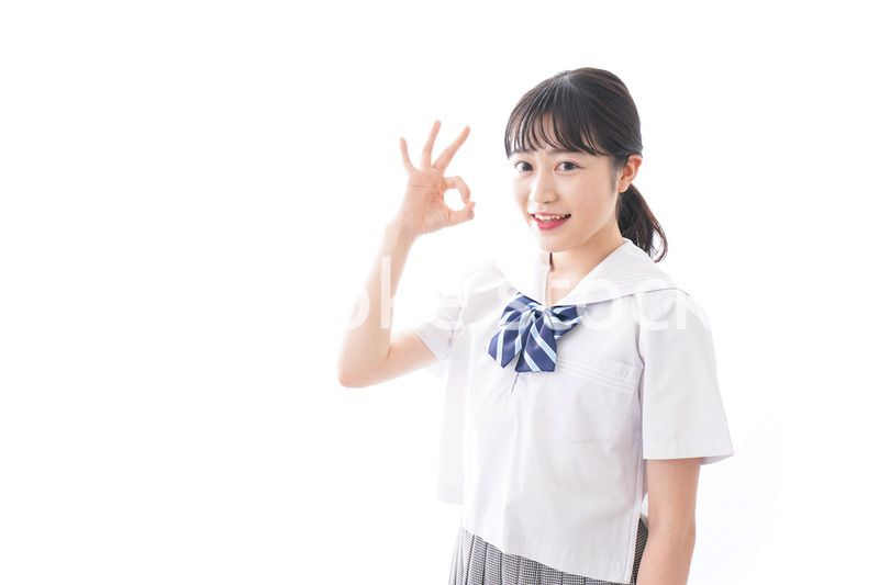 OKサインをする学生