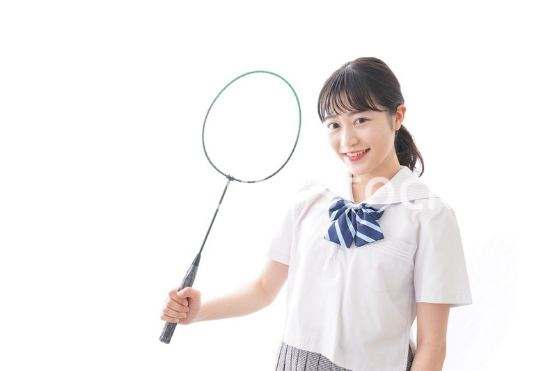 部活をする学生