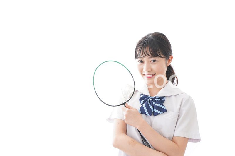 部活をする学生