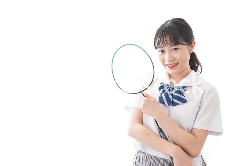 部活をする学生