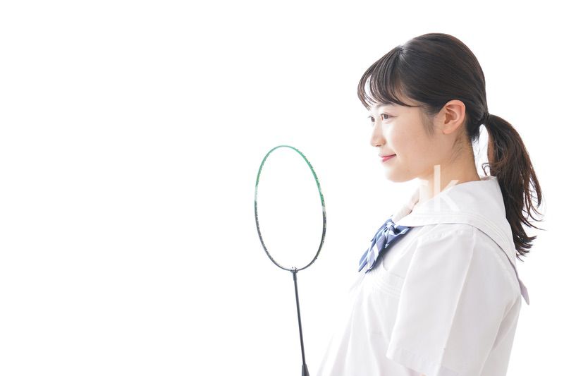 部活をする学生