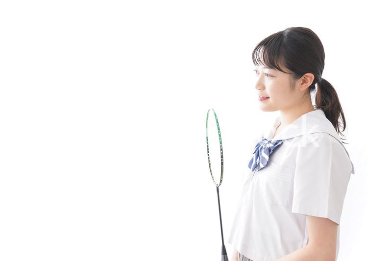 部活をする学生