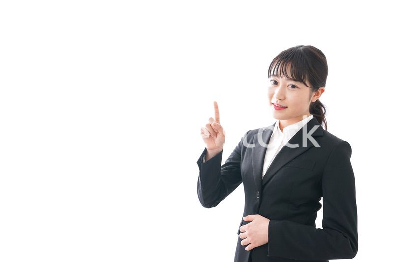 Young business woman pointing something with smile