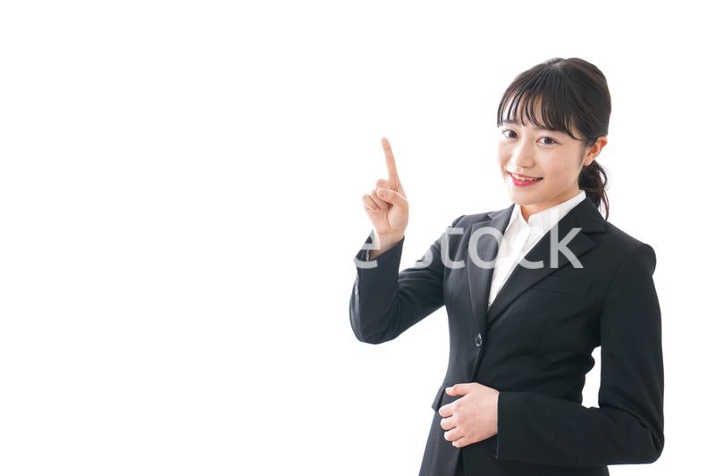 Young business woman pointing something with smile