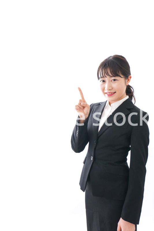 Young business woman pointing something with smile