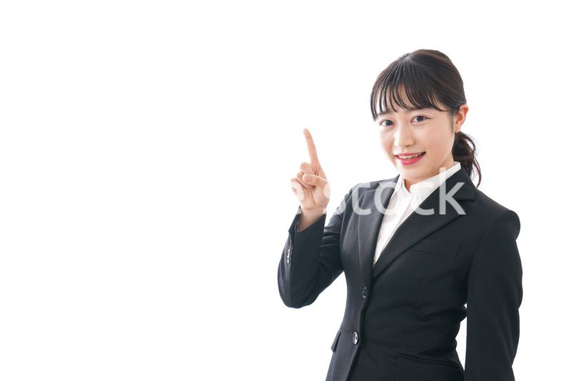 Young business woman pointing something with smile