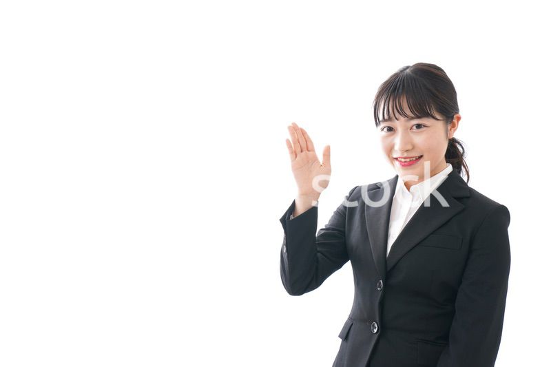 Young business woman pointing something with smile