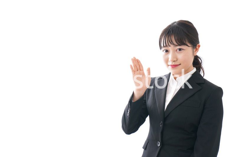 Young business woman pointing something with smile