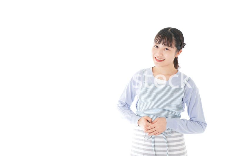 ほほえむ若い主婦