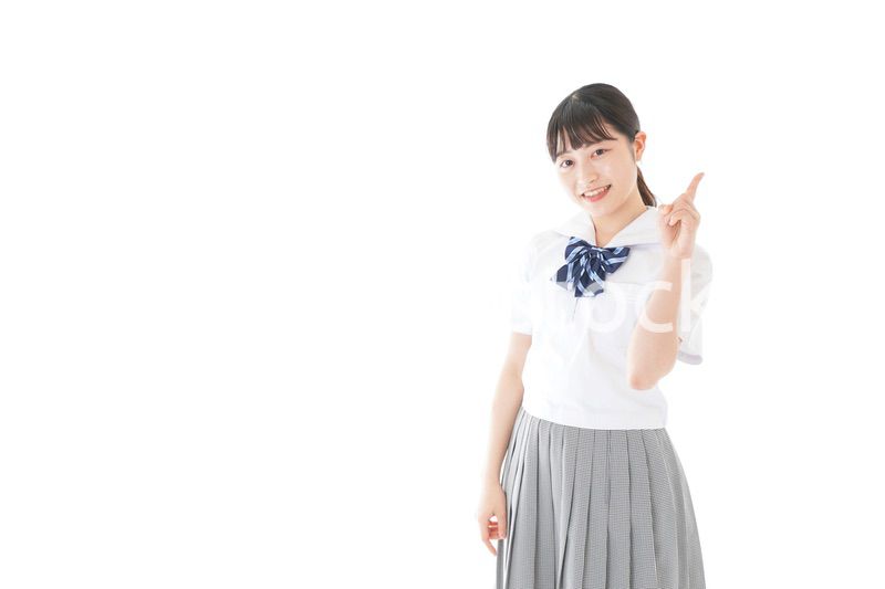 案内をする笑顔の女子学生