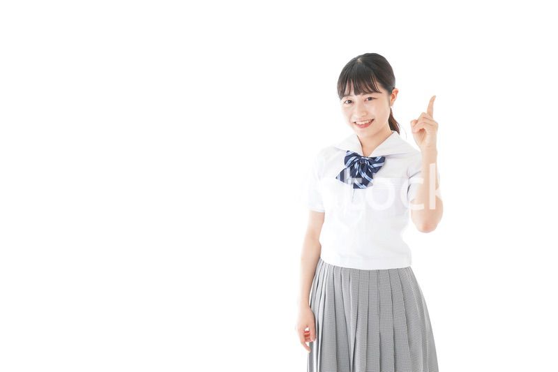 案内をする笑顔の女子学生