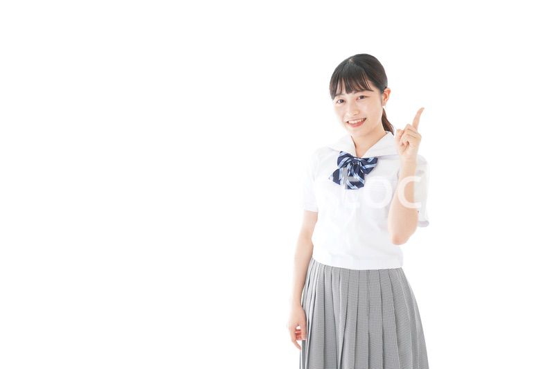 案内をする笑顔の女子学生