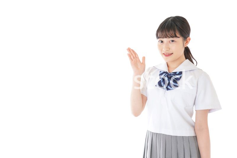 案内をする笑顔の女子学生