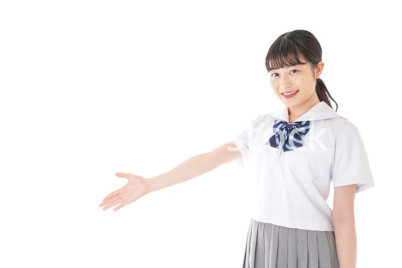 案内をする笑顔の女子学生