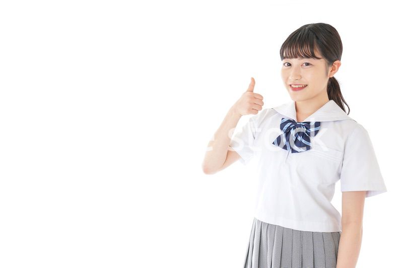 グッドサインをする笑顔の女子学生