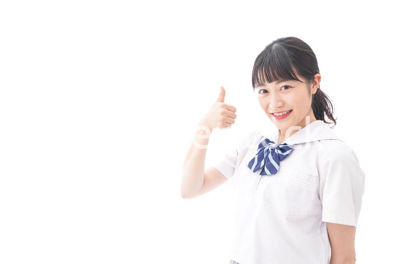 グッドサインをする女子学生