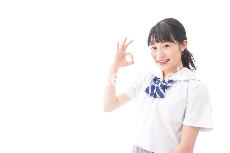 グッドサインをする女子学生