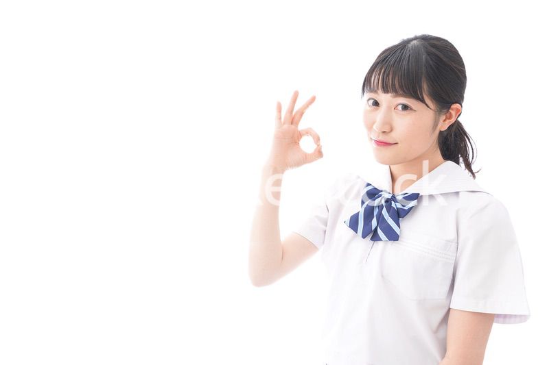 グッドサインをする女子学生