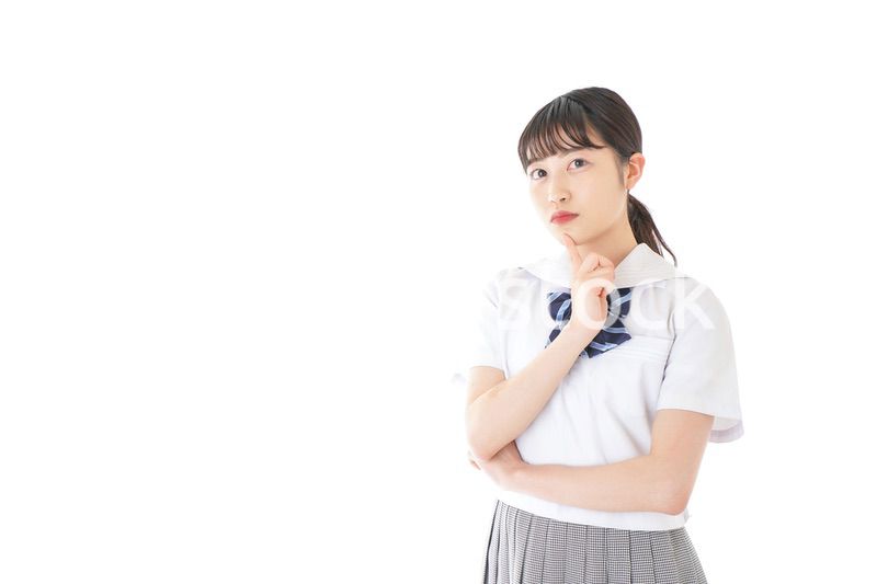 考え事をする学生