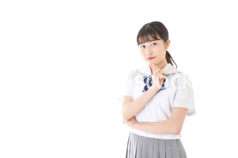 考え事をする学生