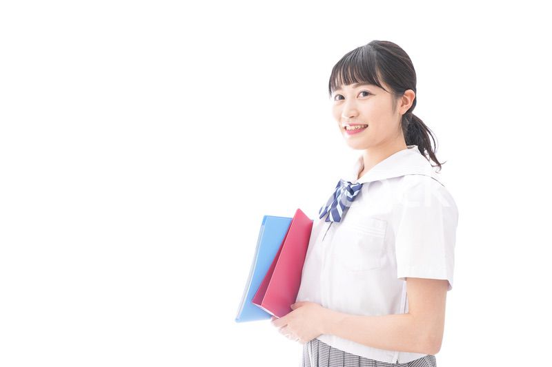 テキストを持つ学生