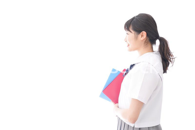 テキストを持つ学生