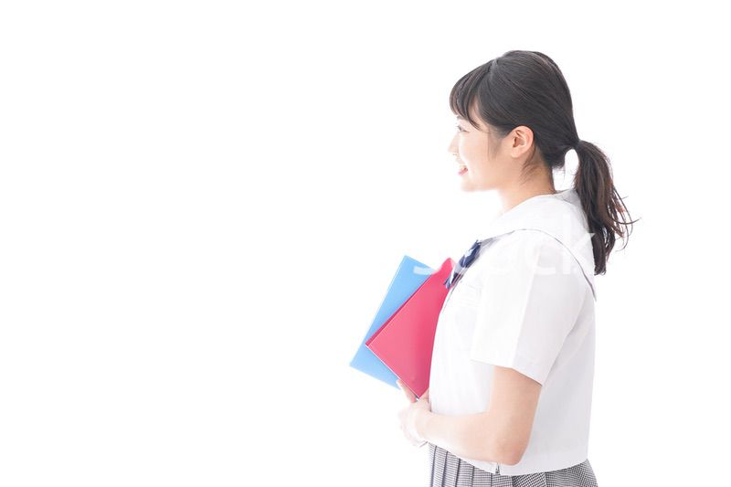 テキストを持つ学生