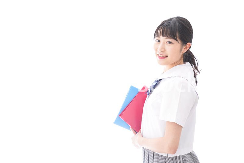 テキストを持つ学生