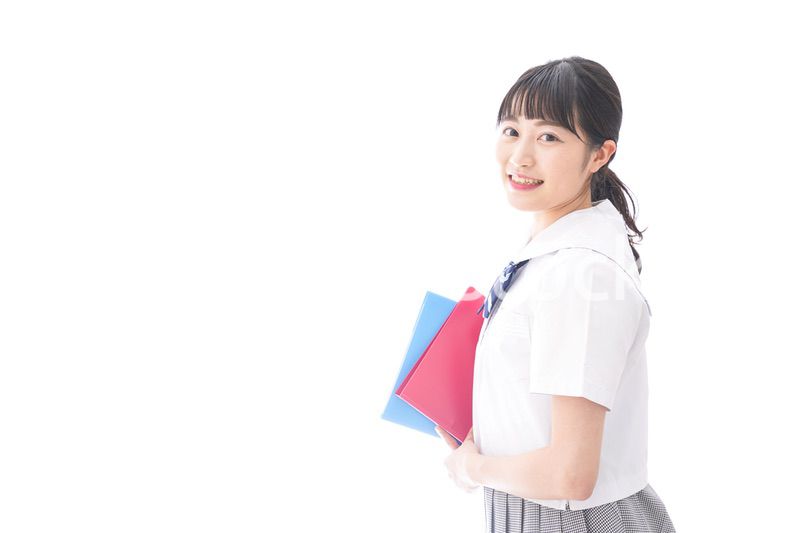 テキストを持つ学生