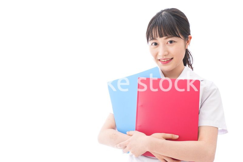 テキストを持つ学生