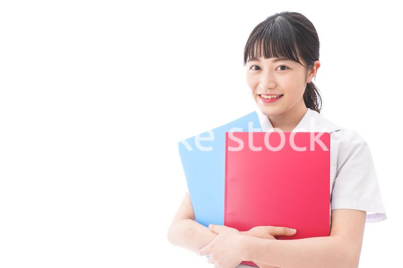 テキストを持つ学生