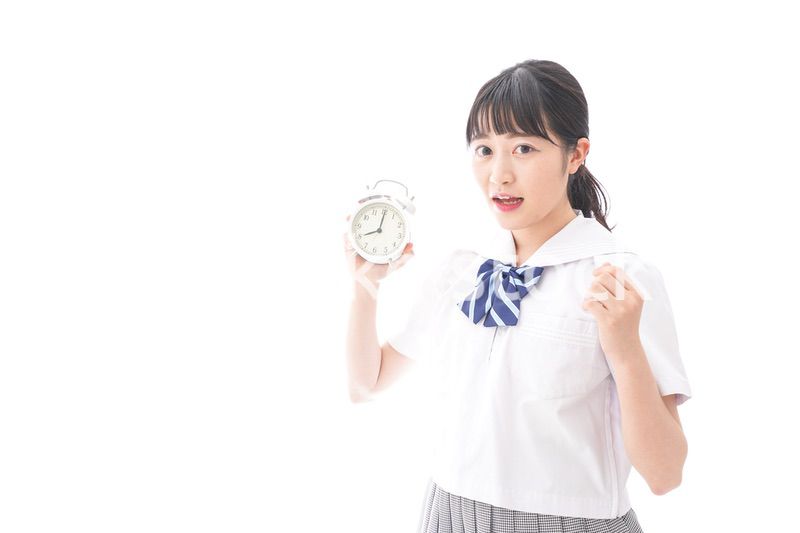 寝坊をする学生