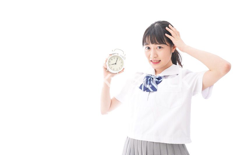 寝坊をする学生