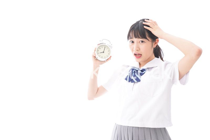 寝坊をする学生