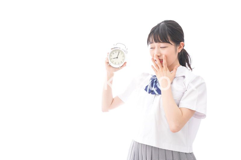 寝坊をする学生