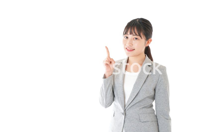 ポイントを指差すビジネスウーマン