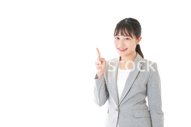 ポイントを指差すビジネスウーマン