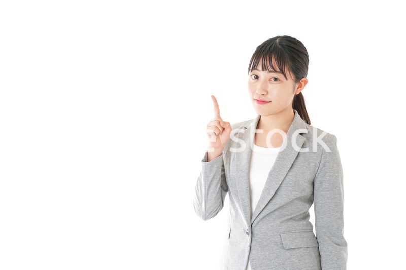 ポイントを指差すビジネスウーマン