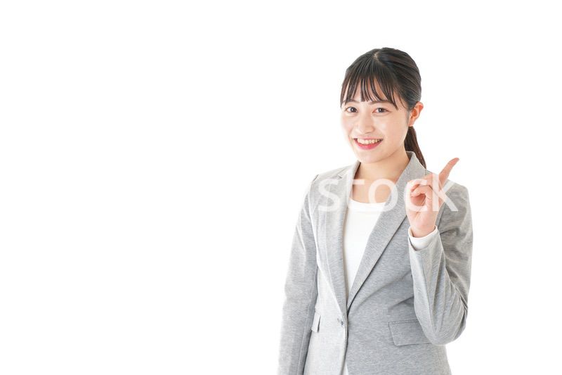 ポイントを指差すビジネスウーマン