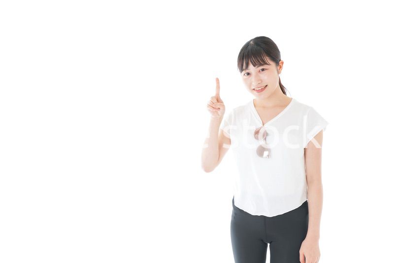 指を指す女性・リゾートイメージ