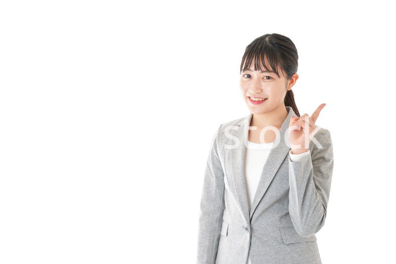ポイントを指差すビジネスウーマン