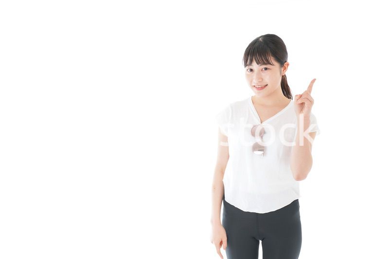 指を指す女性・リゾートイメージ