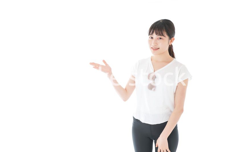 指を指す女性・リゾートイメージ