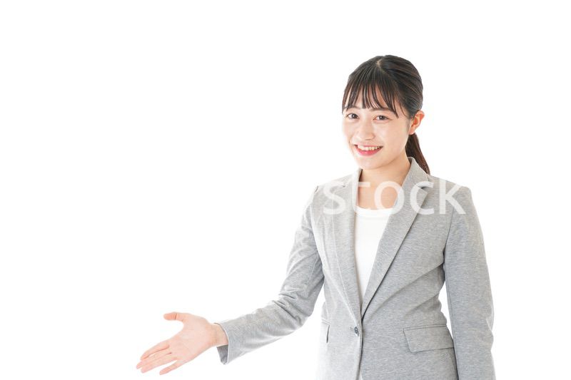 ご案内をするビジネスウーマン