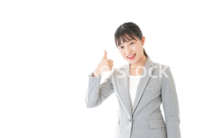 OKサインをするビジネスウーマン