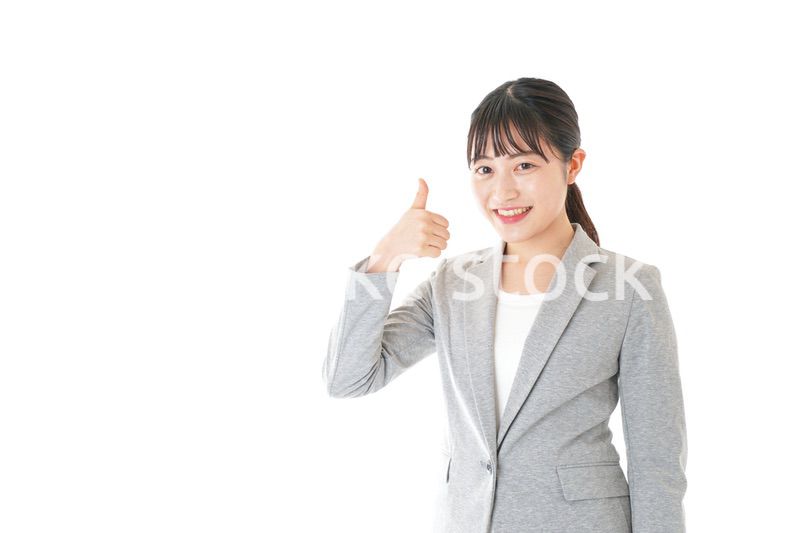 OKサインをするビジネスウーマン