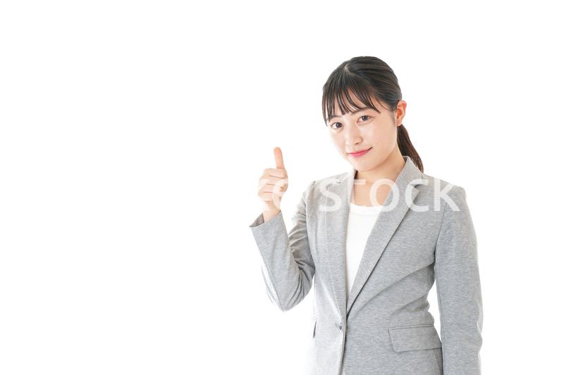 OKサインをするビジネスウーマン