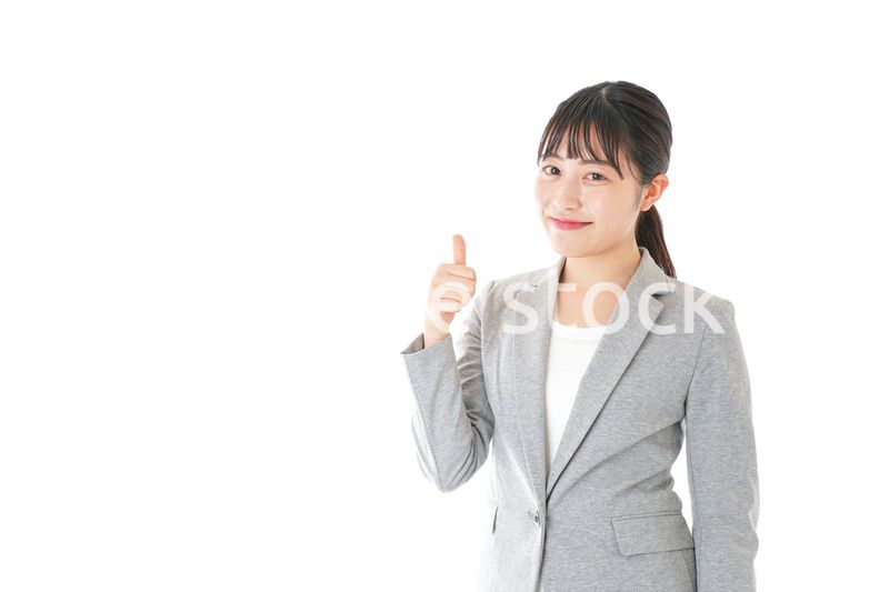 OKサインをするビジネスウーマン