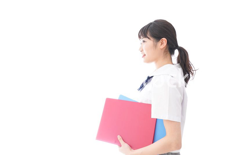 テキストを持つ学生